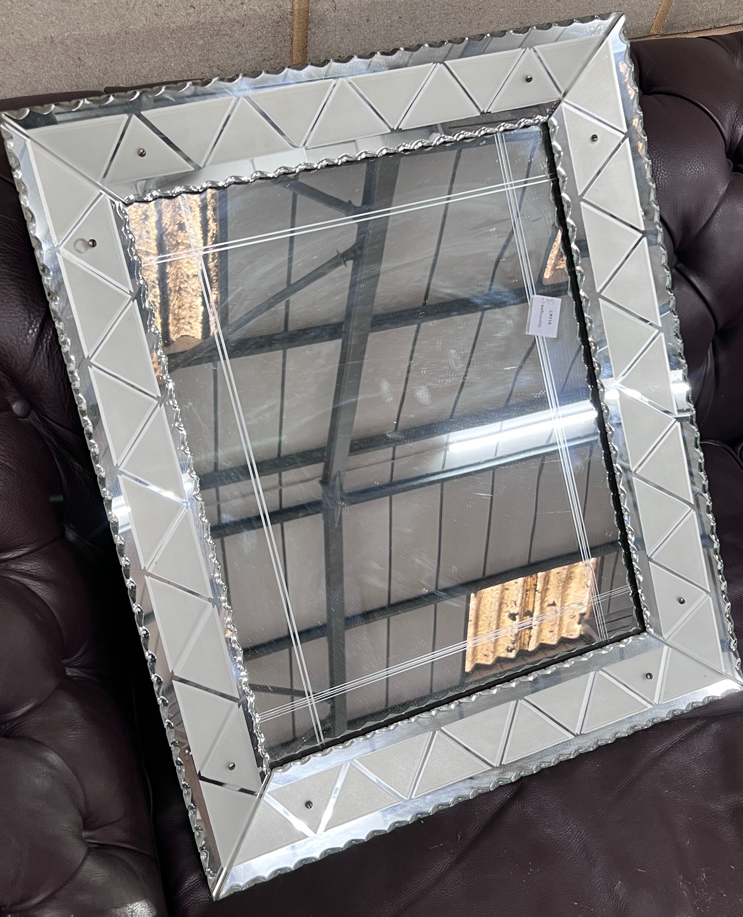 A Venetian style wall mirror, width 72cm, height 60cm *Please note the sale commences at 9am.